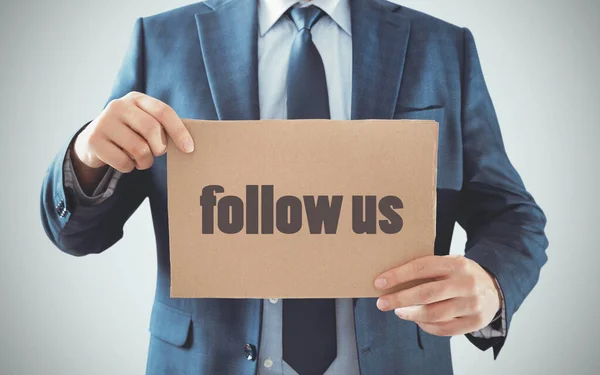 Businessman Holding Cardboard Plate Follow Words Marketing Social Media Concept — Fotografia de Stock