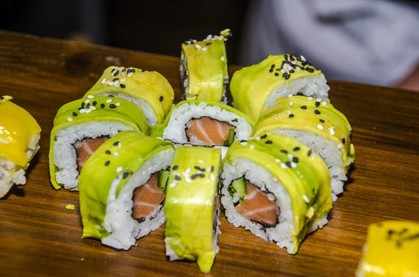 Avocado sushi rolls — Stock Photo, Image