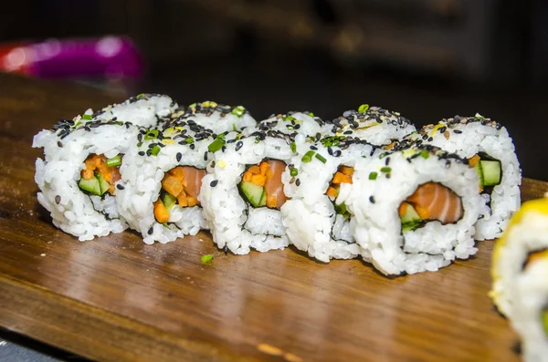 Avocado sushi rolls — Stock Photo, Image