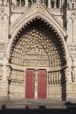 Entrance of the cathedral of Amiens, Picardy, France clipart
