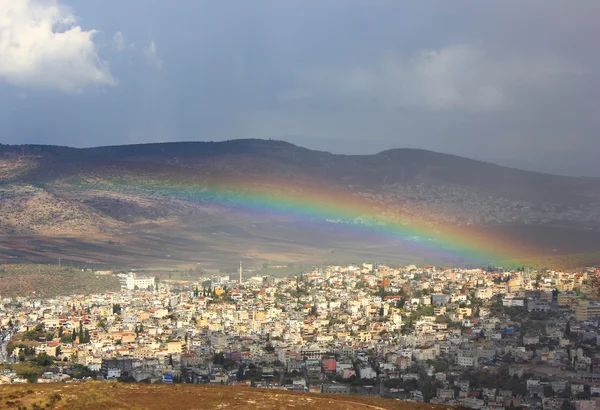 Regnbåge över kana i Galileen, israel — Stockfoto