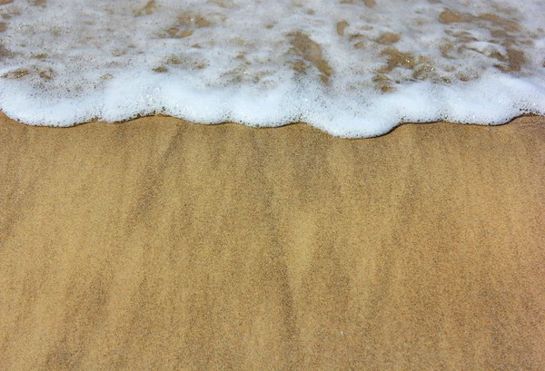 Ondas do mar e areia molhada — Fotografia de Stock