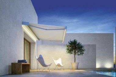 Yüzme havuzlu modern lüks villa, alacakaranlık vuruşu.