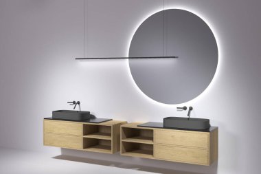 Modern lüks banyo, minimal İskandinav tarzı büyük yuvarlak aynalar, lavabo ve musluk.