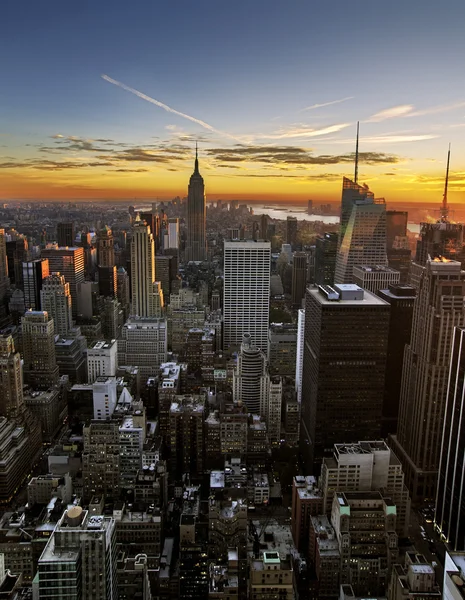 Zonsondergang over manhattan — Stockfoto