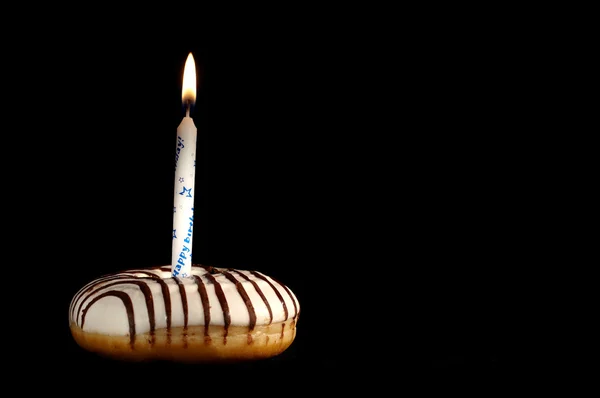 Uma vela no donut . — Fotografia de Stock