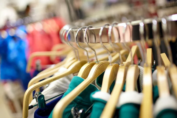Hangers in the clothing store. Stock Picture