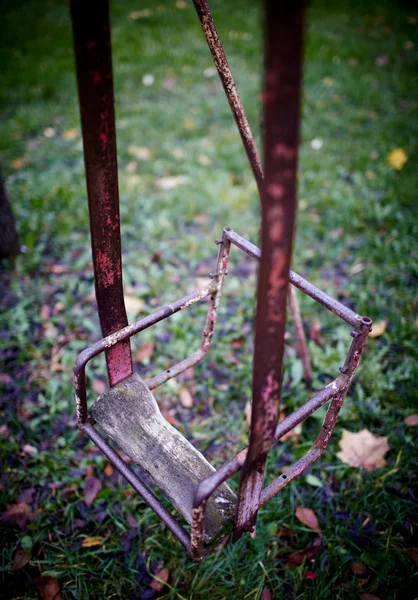 The broken child's swing. — Stock Photo, Image
