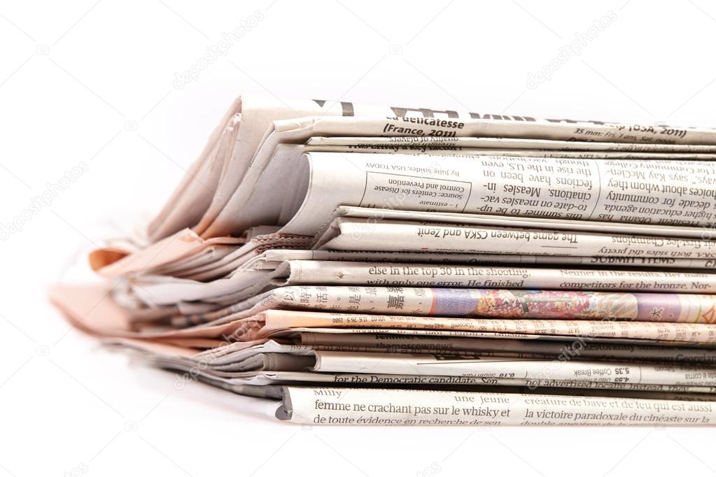 International newspapers on white.