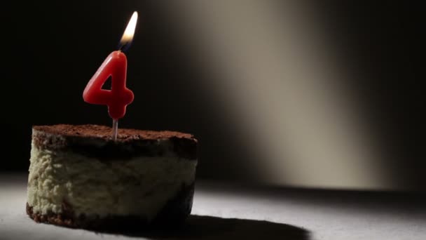 Candle four in tiramisu cake. Birthday vintage background — Stock Video