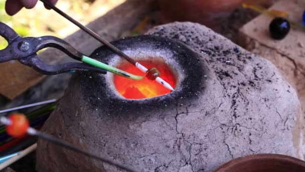 Glass artist in his workshop — Stock Video