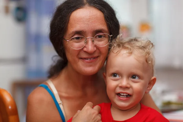 Forty years old mother with her son — Stock Photo, Image