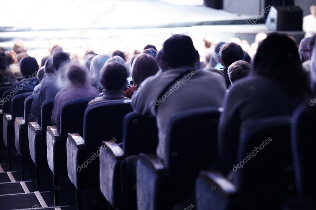 Audience sitting in tiered seating