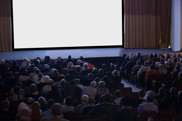 Audience watching cinema — Stock Photo, Image