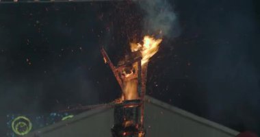 Ninot burning out and being destroyed with fire. Traditional Fallas festival and La Crema final event in Spain