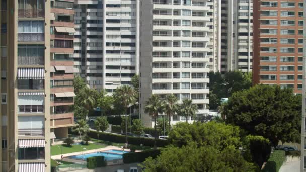 Cityscape Many High Apartment Houses Outdoor Swimming Pool Green Trees — Stockvideo