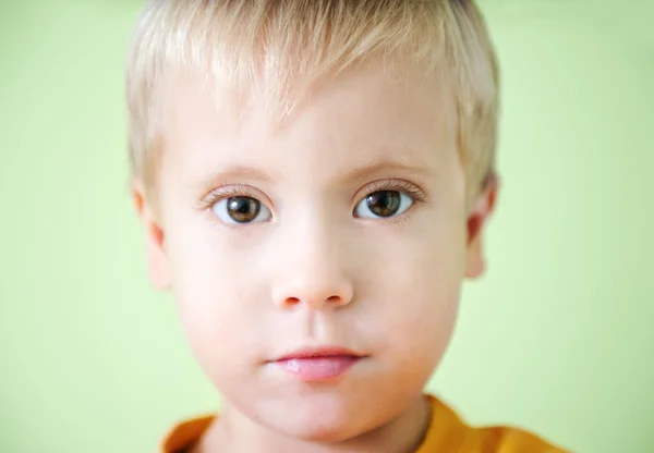 Serious cute little boy — Stock Photo, Image