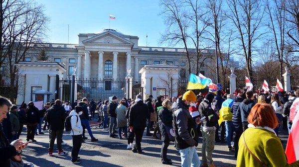Warsaw, Poland. 24 February 2022. Anti-war protest outside Russian embassy in Warsaw. Demonstrators call for peace and condemn Putin. 