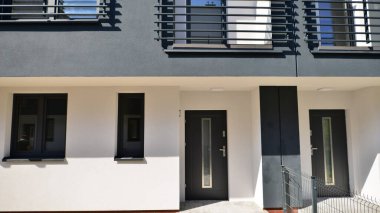 Terraced family home in newly developed housing estate. The real estate market in the suburbs.