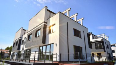 Terraced family home in newly developed housing estate. The real estate market in the suburbs.