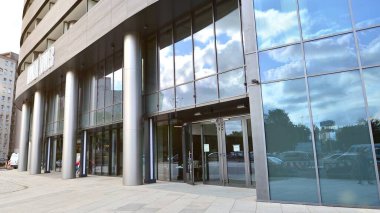 Szczecin, Poland. 30 August 2022. Front view of entrance of modern apartment and office building Hanza Tower. 