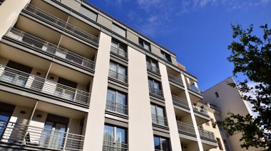 Modern residential building on a sunny day. Apartment house.