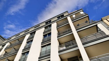 Modern residential building on a sunny day. Apartment house.