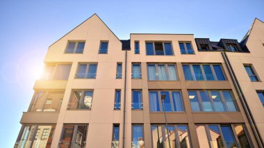 Modern residential building on a sunny day. Apartment house.