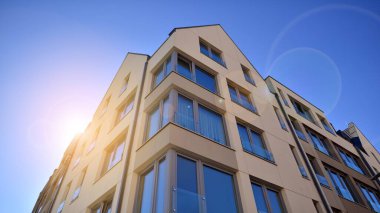 Modern residential building on a sunny day. Apartment house.
