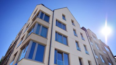 Modern residential building on a sunny day. Apartment house.