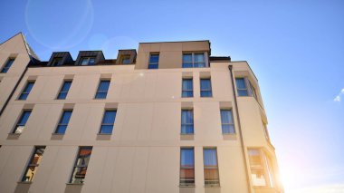 Modern residential building on a sunny day. Apartment house.