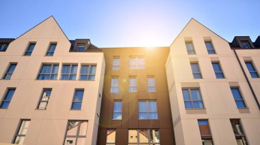 Modern residential building on a sunny day. Apartment house.