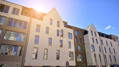 Modern residential building on a sunny day. Apartment house.
