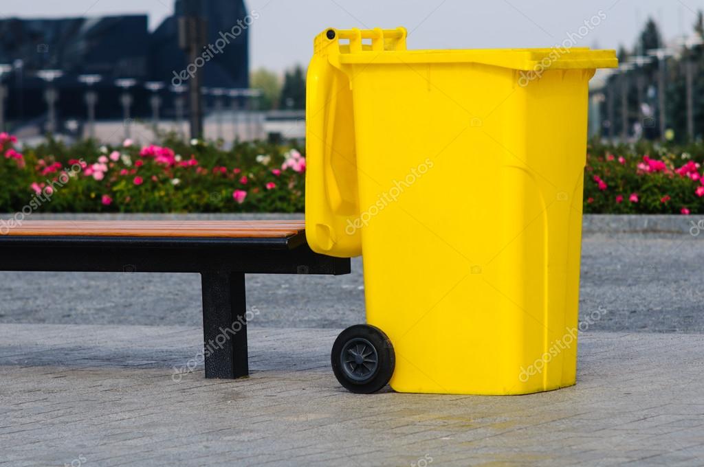 Yellow recycling container Stock Photo by ©nickvelichko 13593418