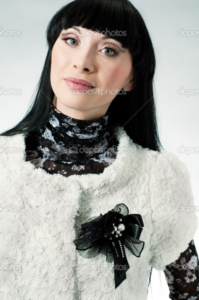 Girl with black brooch
