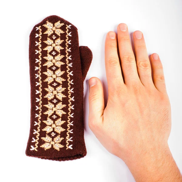 Brown mitten an hand — Stock Photo, Image
