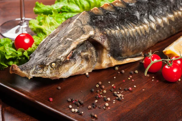 Roasted sturgeon with white wine — Stock Photo, Image