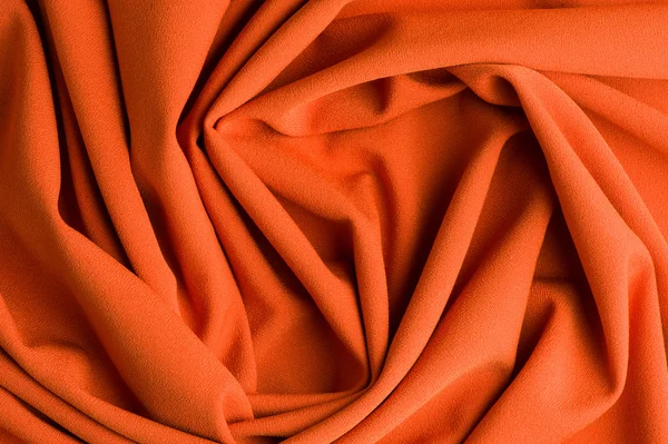 Spiral folds on red cloth — Stock Photo, Image
