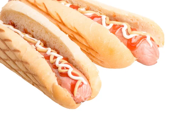 Hot dogi z musztardą i ketchupem — Zdjęcie stockowe