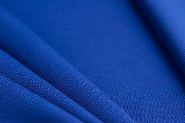 Blue cloth with straight folds — Stock Photo, Image