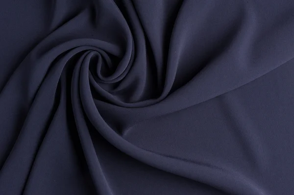 Spiral folds on grey cloth — Stock Photo, Image