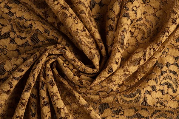 Spiral folds on Yellow lace fabric — Stock Photo, Image