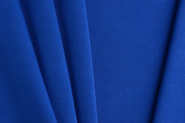 Blue cloth with straight folds — Stock Photo, Image