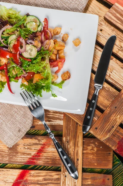 Salad served with fried meat — Stock Photo, Image