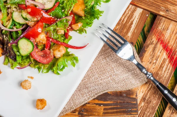 Salad served with fried meat — Stock Photo, Image