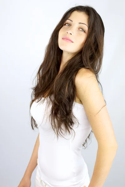 Beautiful girl posing with white tshirt — Stock Photo, Image