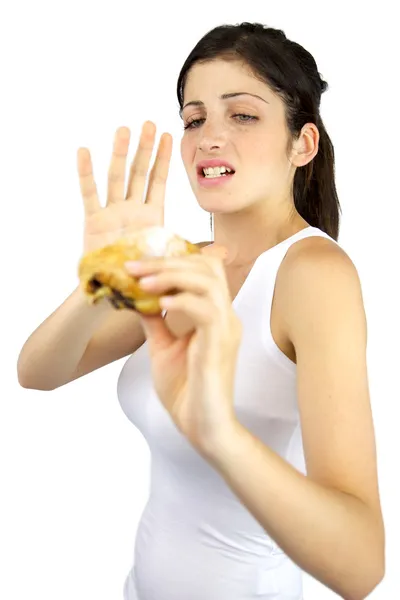 Woman scared by sweet snack with chocolate Stock Photo