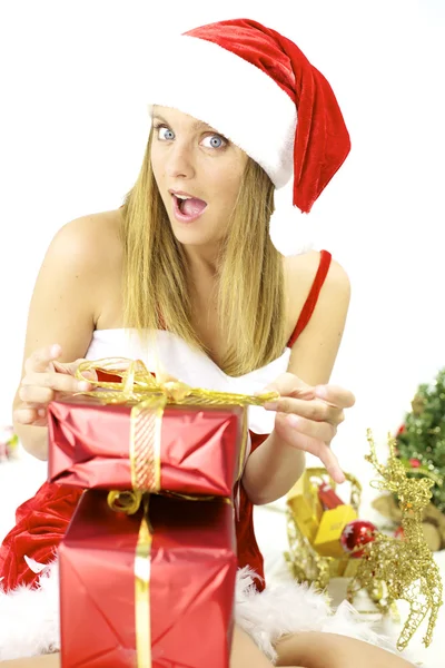 Happy female Santa Claus preparing packages — Stock Photo, Image