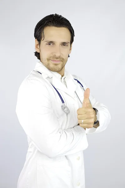 Zadowolony lekarz z jeden kciuk — Zdjęcie stockowe