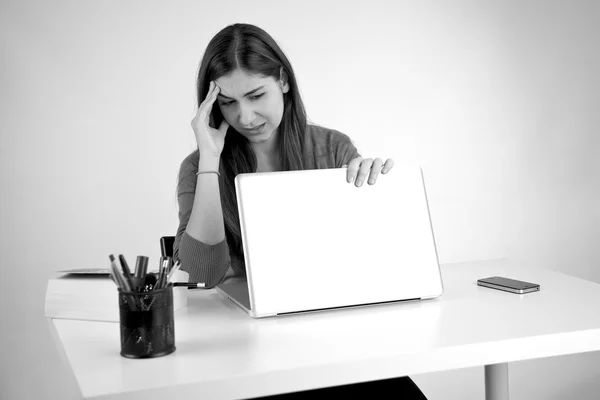 Stressed out woman closing computer — Stock Photo, Image